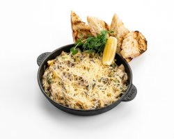 Мясо мидий в сливочном соусе
